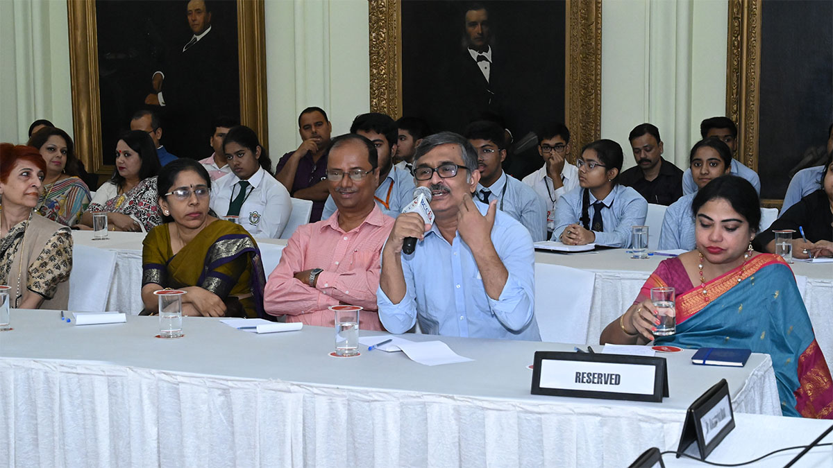 Distinguished audience asking questions